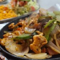 Fajitas Mixta · steak,chicken and shrimp cam with tortillas,salad and beans