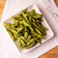 Edamame · Spicy. Wok tossed fiery edamame with sriracha butter or original with sea salt.
