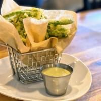 Green Bean Fries · Crispy battered green beans, served with cucumber infused wasabi ranch dip.