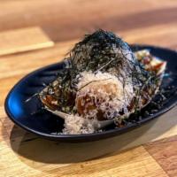 Takoyaki · Dashi battered octopus balls, drizzled kewpie topped with bonito flakes, aonori.