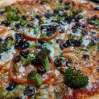 Small 10'' Primavera Pizza Pizza · Ricotta, mozzarella, Romano, spinach, eggplant, broccoli, tomatoes.