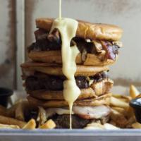 Frita By Kush · *Voted one of the top 52 burgers in the US* 
Topped with guava jelly, potato stix, bacon, Sw...