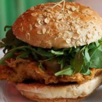 Farmstyle Chicken Sandwich · Crispy chicken topped with Jack cheese, arugula, red onion and BBQ Sauce. Served on a Honey ...