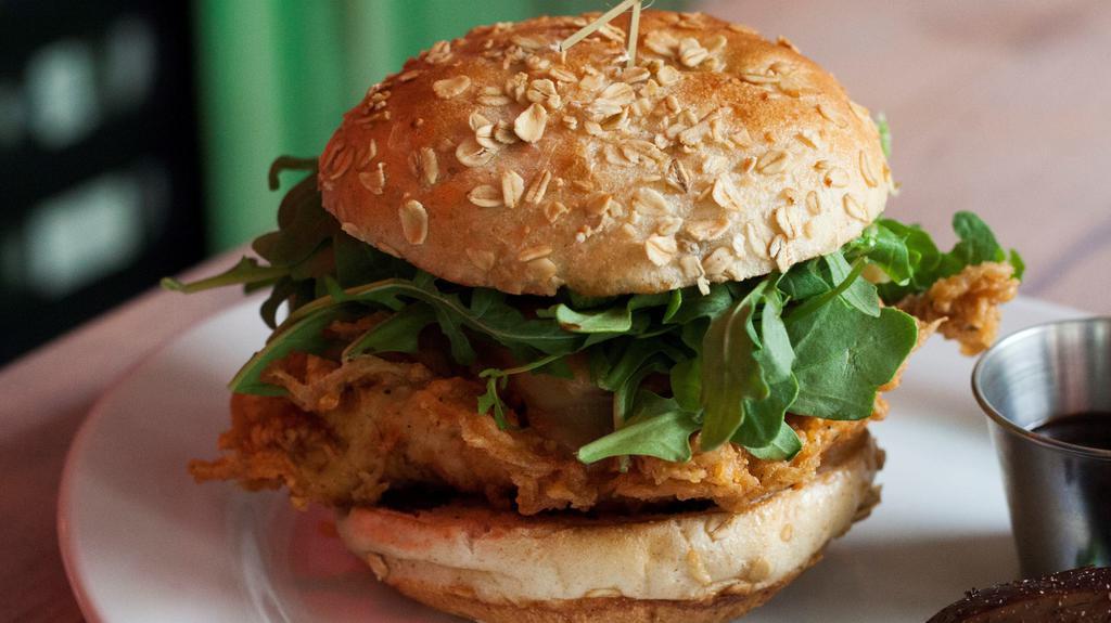 Farmstyle Chicken Sandwich · Crispy chicken topped with Jack cheese, arugula, red onion and BBQ Sauce. Served on a Honey Wheat bun.
