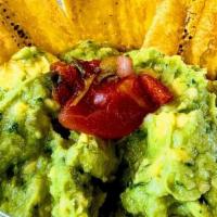 Guacamole · Gluten-Free Smashed avocado, red onion, cilantro and jalapeños mixed with spices.