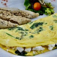 Greek Omelette · 3 fresh eggs omelette, spinach, feta cheese, multigrain baguette