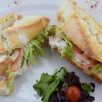 Chicken Salad Sandwich · Shredded chicken breast, red seedless grapes, celery, tarragon, light mayo, greens, fresh to...