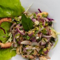 Plah Pla Meuk/Octopus Lemongrass Salad · Spicy marinated octopus in lime juice tossed with roasted chili paste, lemongrass, kaffir li...