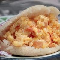 Pericos ( Arepa ) · With scrambled eggs, tomatoes & onions .