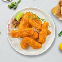 Ride The Buffalo Tenders · Chicken tenders breaded and fried until golden brown before being tossed in buffalo sauce.