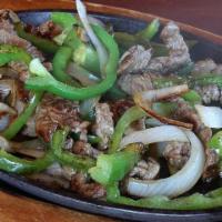 Fajitas Authenticas · Your choice of one protein, grilled with onions, and peppers, served with Mexican rice, refr...