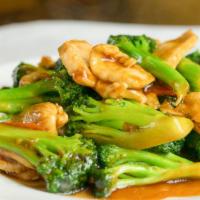 Chicken With Broccoli · Sliced chicken stir-cooked with broccoli in chef's special brown sauce. Served with steamed ...
