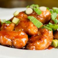 Orange Chicken · Served with white or brown rice.