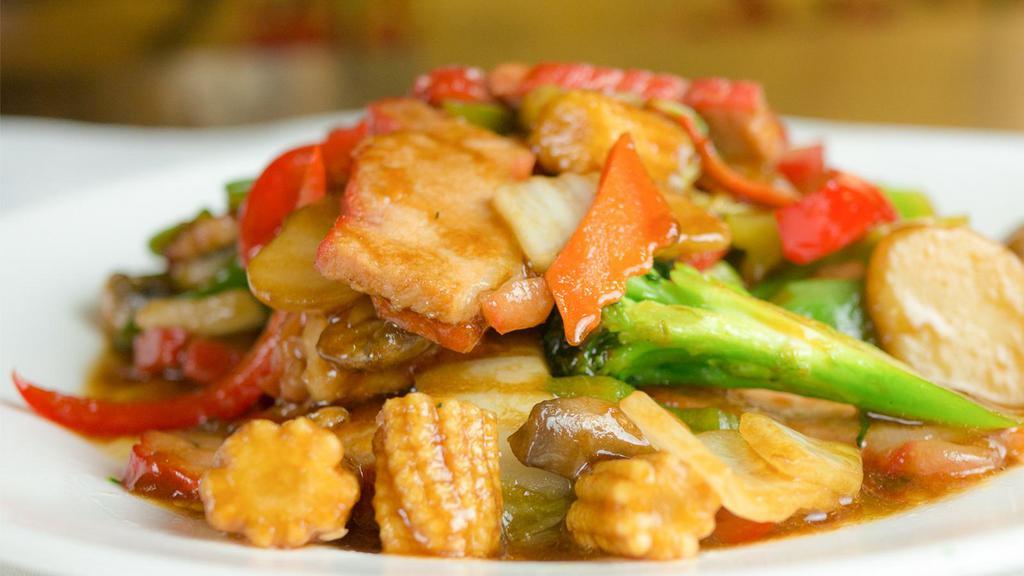Roasted Pork With Mixed Vegetables · Sliced roasted pork stir-cooked with bai choi, baby corn, mushrooms, water chestnuts, snow peas, carrots and broccoli in chef's brown sauce. Served with steamed white or brown rice.