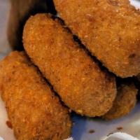 Ham Croquettes (8 Pieces) · Served with mambos sauce.