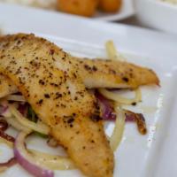 Grilled Fish (2 Pieces) & Shrimps (5 Pieces) · Served with two fish filets and five jumbo shrimps.