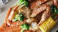 Snow Crab Legs · It comes with 1 cluster in the garlic butter sauce. If you order with sides, it will come wi...