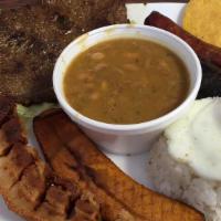 Bandeja Montanera · Typical colombian platter served with grilled steak, pork sausage, blood sausage, chicharron...