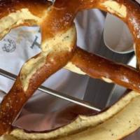 Enormous Bavarian Pretzel · 10 oz pretzel served with spicy mustard and beer cheese.