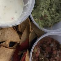 Chip Trio · Guacamole, salsa and queso dip served with corn tortilla chips.