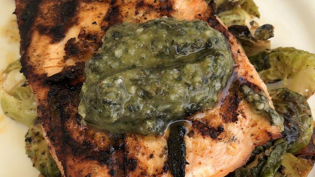 Salmon Pesto & Brussels · Grilled salmon topped with pesto made in house and served with brussel sprouts.