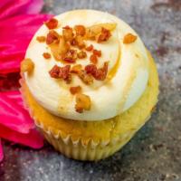 Pancakes N Bacon · Vanilla maple cupcake with a vanilla cream cheese frosting, real bacon sprinkles with a mapl...