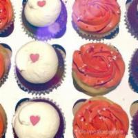 Hearts & Roses · This dozen includes six red velvet cupcakes with a cream cheese frosting and six vanilla cup...