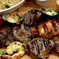 Mixed Grill Platter · all meats are grilled, pre-marinated over night. 2 pcs of chicken, 2 beef, 2 pcs lamb,2 jumb...