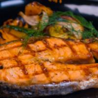 Salmon Steak · Freshest Alaskan Salmon steak grilled to perfection, serves with shabo's potatoes, side of t...