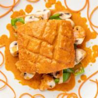 Salmon Curry · Hot & Spicy. Fried salmon, mushrooms, bell peppers, served in mild spicy, tasty red curry sa...