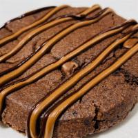 Nutella Stuffed Cookie · Nutella infused cookie dough,stuffed to perfection with Nutella and topped with Nutella driz...