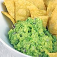 Guacamole Chips · Our fresh made guacamole served with crispy chips.