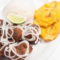 Masas De Puerco · Fried Pork Chunks Topped with Cuban Mojo and Onions