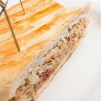 Pan Con Lechon · Roast Pork Sandwich on Cuban Bread with Onions and Mojo