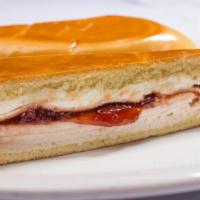 Elena Ruz · Fresh Roasted Turkey Breast, Cream Cheese, Strawberry Marmalade on a Sweet . Egg Roll