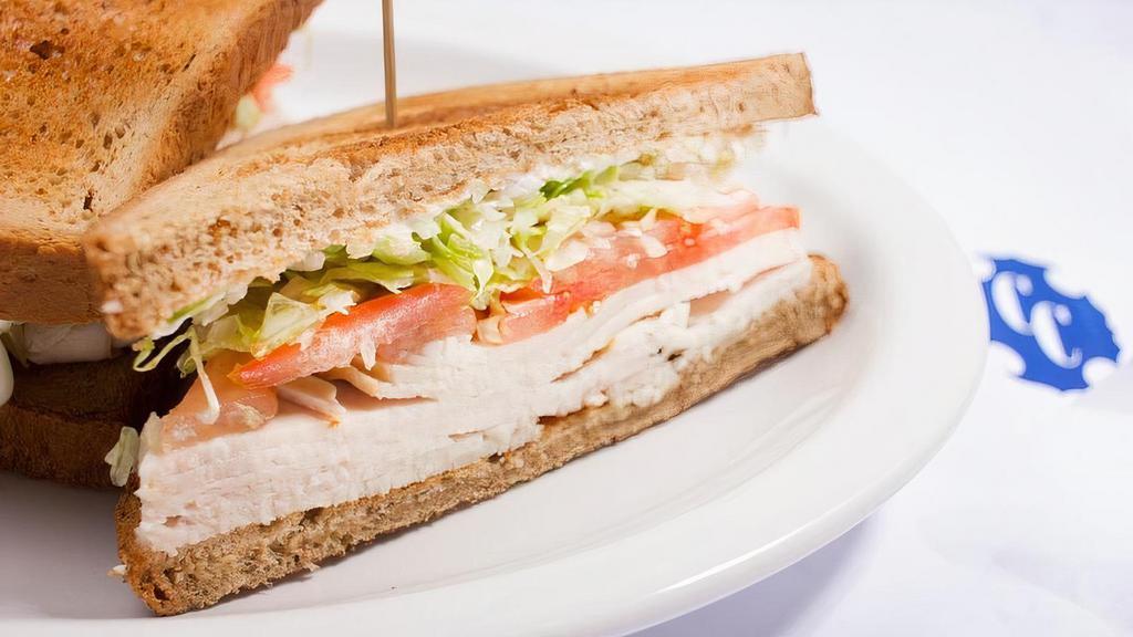 Sandwich De Pavo/Pan Molde · Fresh Roasted Turkey Breast with Lettuce, Tomatoes and Mayonnaise