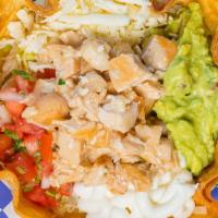 Takitos Salad With Chicken · Mixed greens, tomatoes, guacamole, cotija cheese, pico de gallo and sour cream. Served with ...