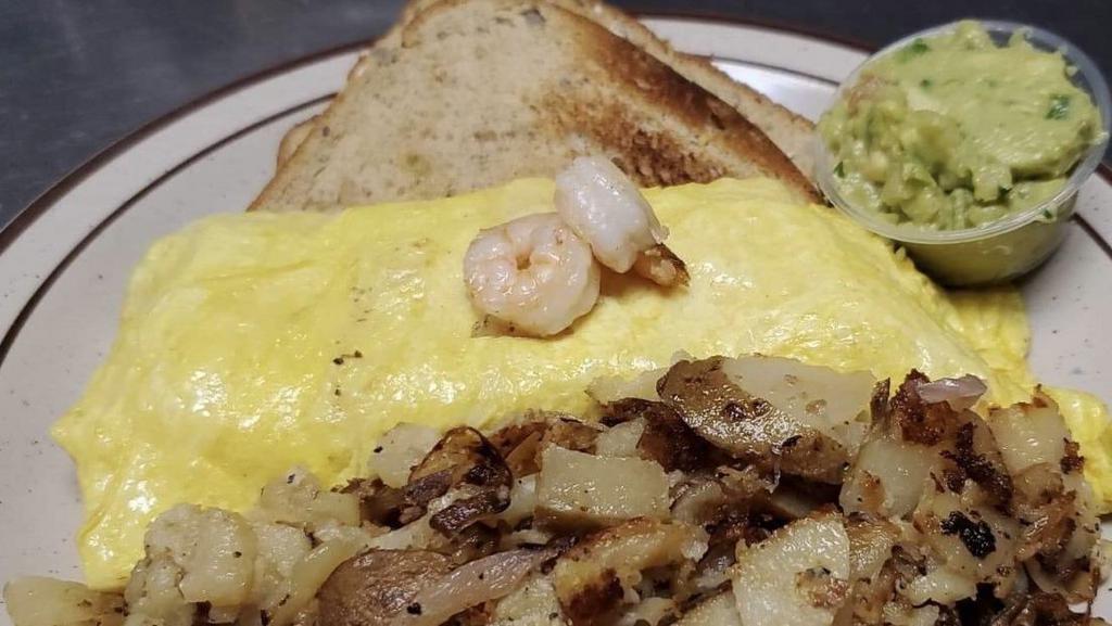California Omelette · Seafood and white cheddar cheese with guacamole on the side.