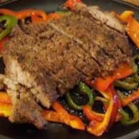 Fajitas · Beef or chicken fajitas cooked with green bell pepper, onions, and tomatoes. With rice, bean...