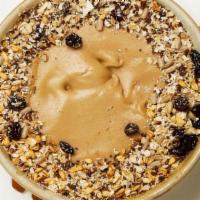 Peanut Bowl · Banana, peanut butter, and almond milk mix, and granola topping.