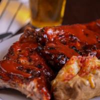 Full Rack Of Ribs · Baby Back Ribs served with one side and garlic bread