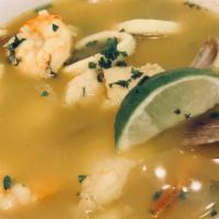 Sopa Marinheira · Seafood soup, mussels, shrimp, squid, and fish.