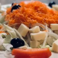 Salada Portuguesa · Lettuce, tomato, onions, olives, carrots, cheese, & boiled eggs.