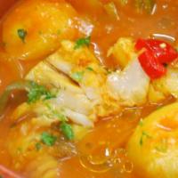 Caldeirada De Bacalhau Dinner · Codfish stewed in tomato sauce with peppers, onions and steamed potatoes.