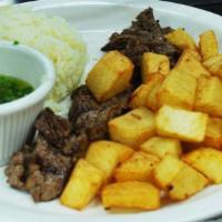 Bife No Churrasco · Grilled Flank steak with rice and fried potatoes.
