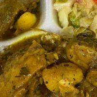 Curry Chicken · White Rice or Rice & Peas, Served with steamed cabbage.