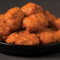 Buffalo Boneless (6Pc Or 10Pc) · Tender all-white meat breaded chicken oven-baked and covered in a classic buffalo wing sauce...