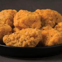 Plain Boneless (10Pc) · Tender all-white meat breaded chicken,oven-baked and served plain with your choice of dippin...