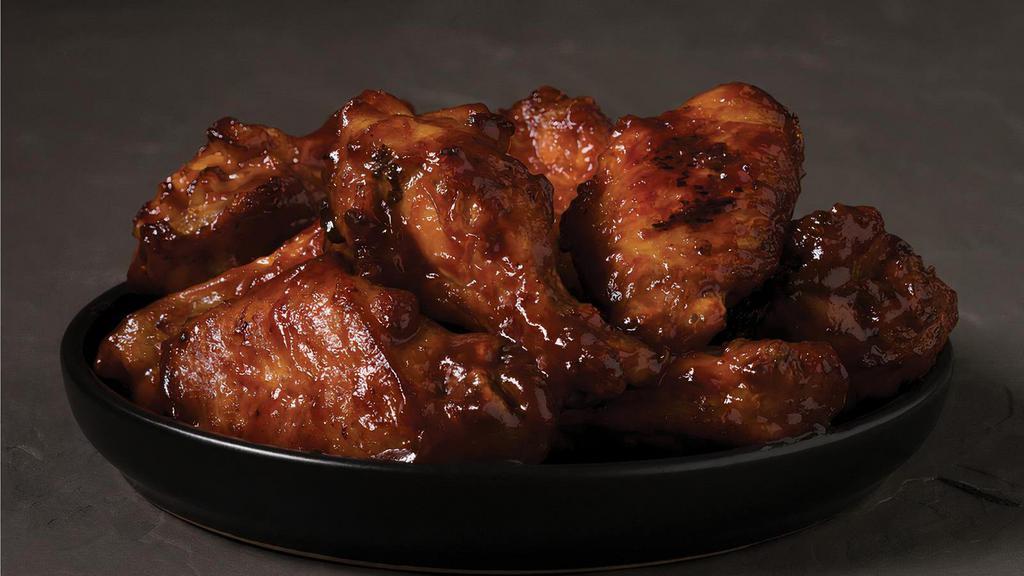 Bbq Wings (10Pc) · Traditional wings oven-baked and covered in a sweet and smoky BBQ sauce,served with your choice of dipping sauce