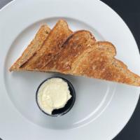 Side Of Multigrain Toast · Two slices of toasted organic multigrain toast with your choice of sauce